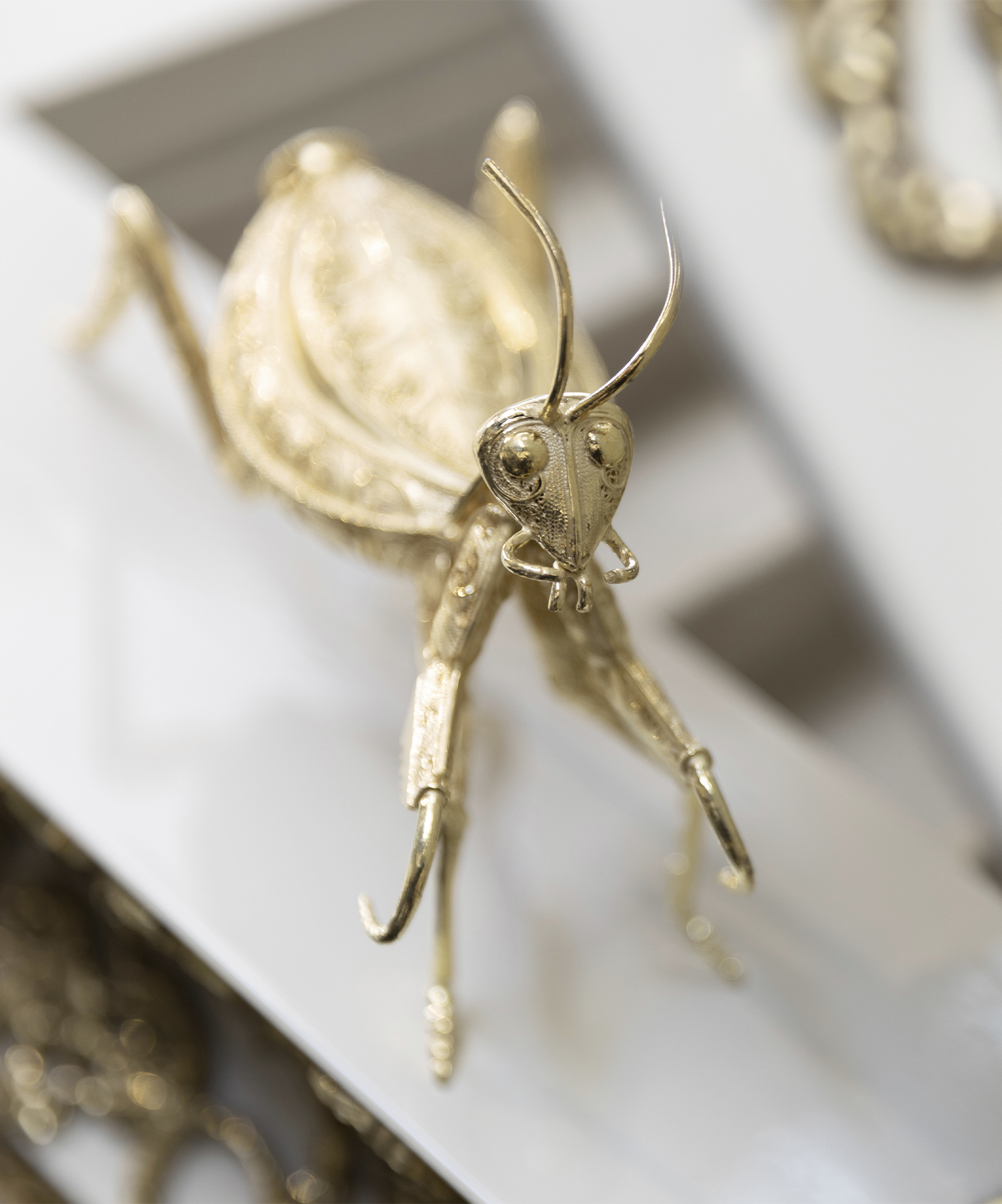 PRAYING MANTIS GOLD