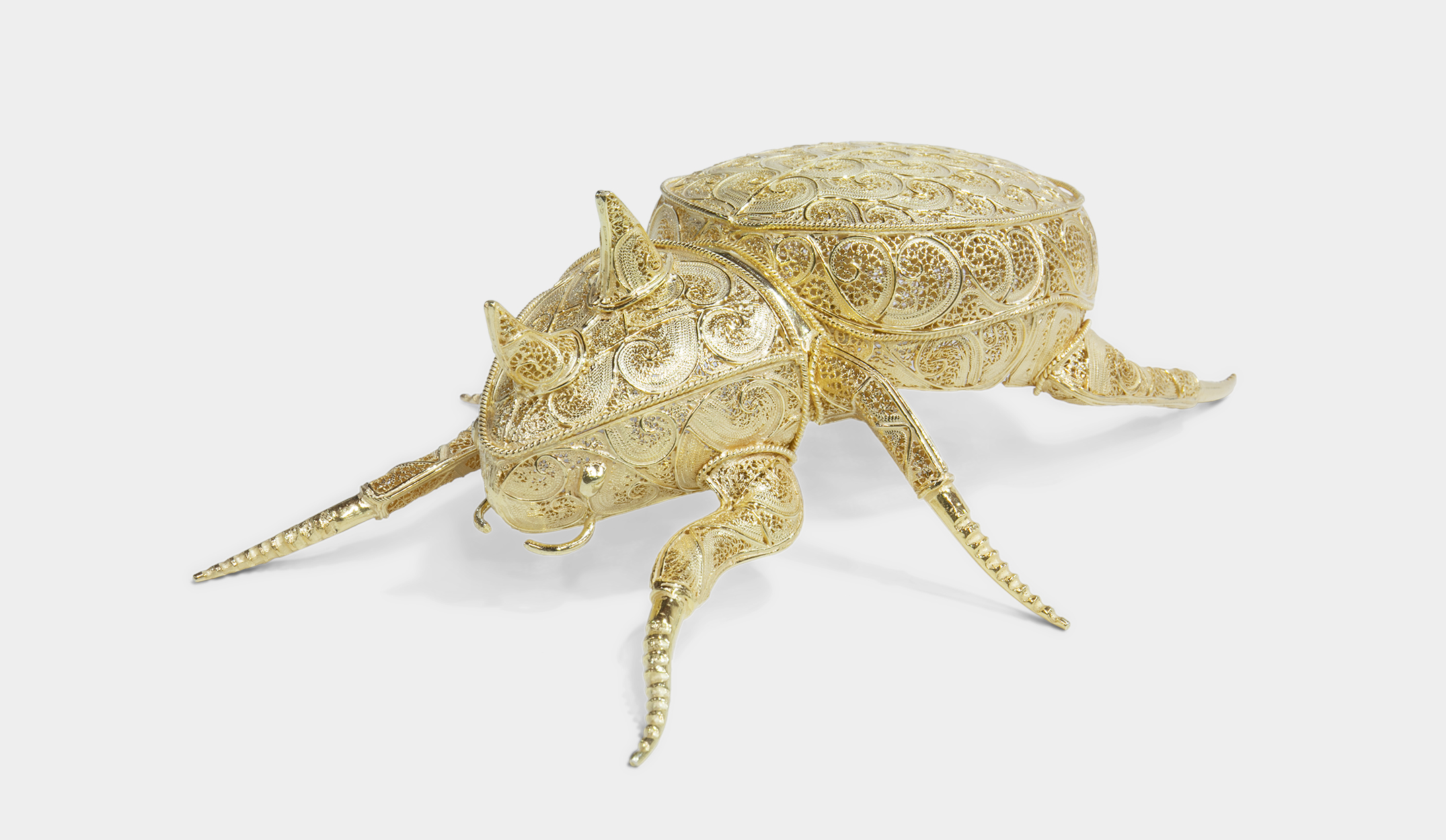 Filigree Rhinoceros Gold