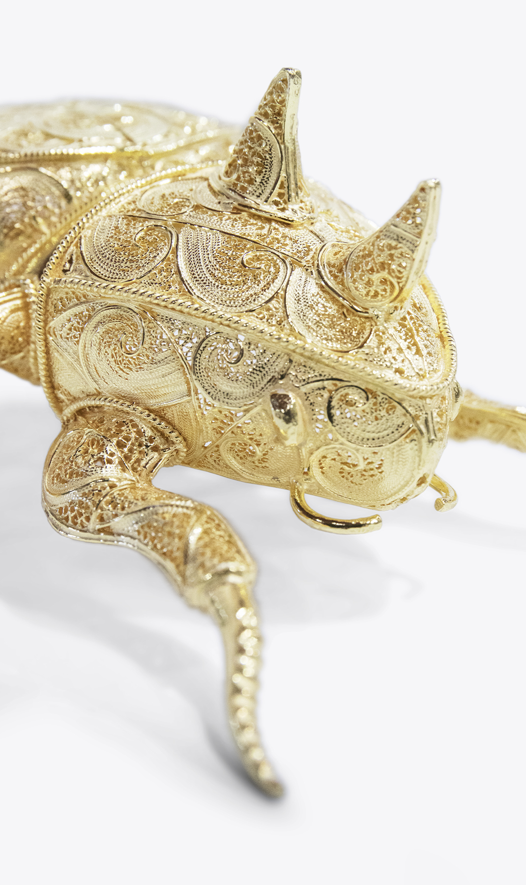 Filigree Rhinoceros Gold